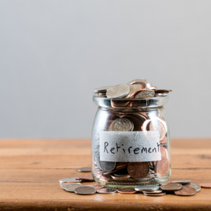 A picture of a jar with spare change.