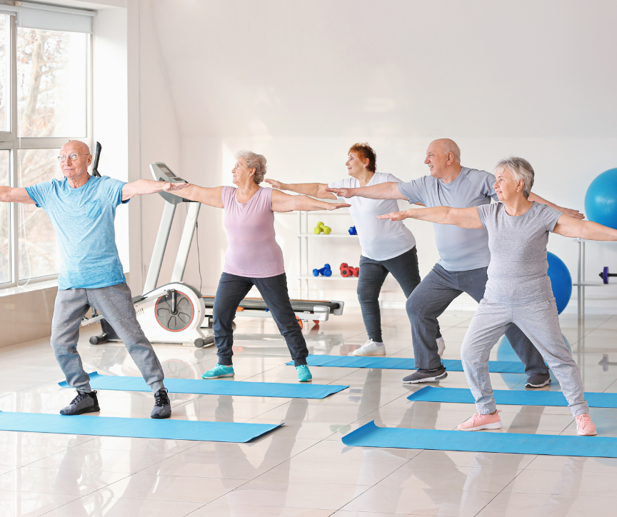 A group of seniors in a yoga class. A great hobby and one of the excellent Ways to Enjoy a Fulfilling Retirement