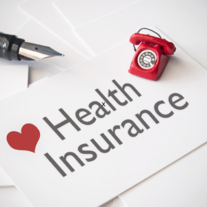 Health savings account: A picture of a paper with a "Health Insurance" writings